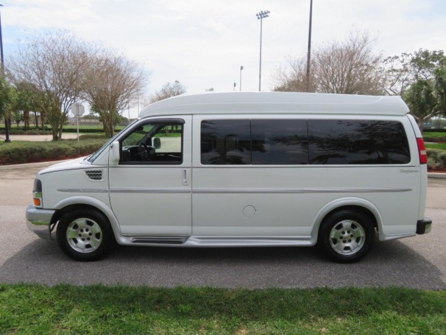 2010 White /Gray Chevrolet Express (1GNUGCD48A1) , located at 4301 Oak Circle #19, Boca Raton, FL, 33431, (954) 561-2499, 26.388861, -80.084038 - You are looking at a Gorgeous 2010 Chevy Express Handicap Wheelchair Conversion Van Explorer Limited SE with 31K Original Miles, Braun Century 750lb Side Entry Wheelchair lift, Tie Down System in the Floor, Rear Entertainment with Flat Screen TV/DVD, Leather Interior, Rear Power Folding Bench Seat/b - Photo#23